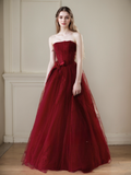 Elegant Strapless Burgundy Tulle Ball Gown with Corset Back and Ribbon Tie Ruby Red